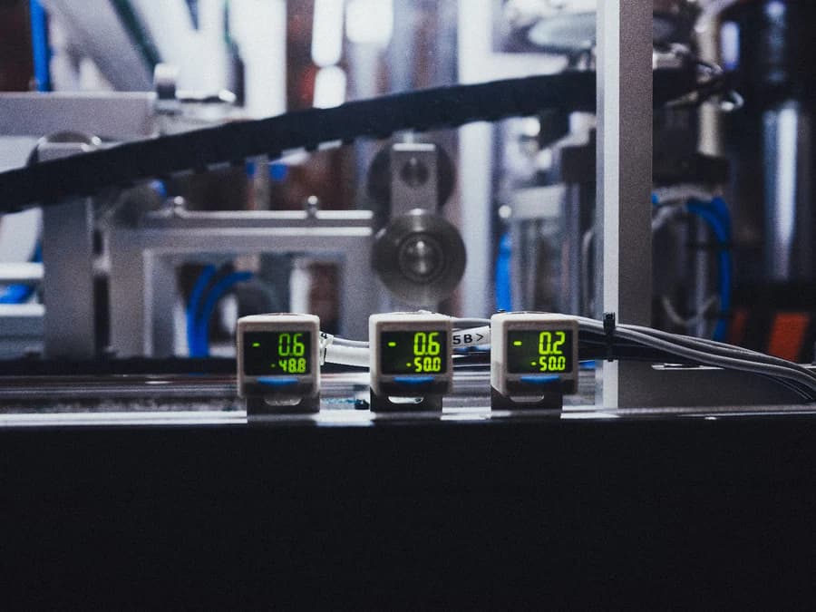 Digital pressure gauges on a vinyl press at The Jungle Record Press